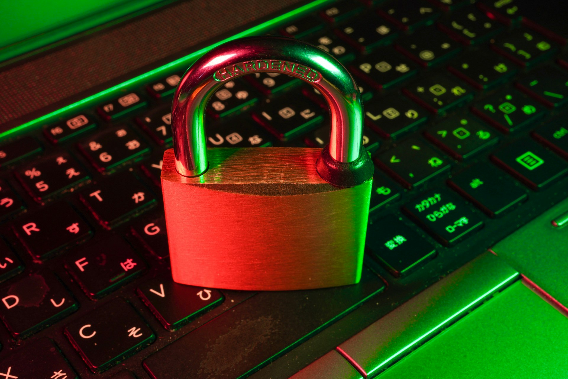 Padlock resting on a laptop keyboard